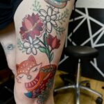 Fox and flowers tattoo