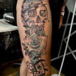 Thigh tattoo